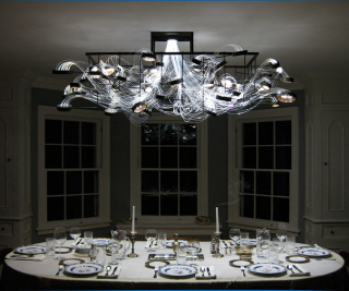 Illustration for article titled A chandelier made from petri dishes that actually grows bacteria
